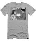 1960s Teenage Girl Blowing Out Candles on Birthday Cake Held By Boy Panoramic Images T-Shirt