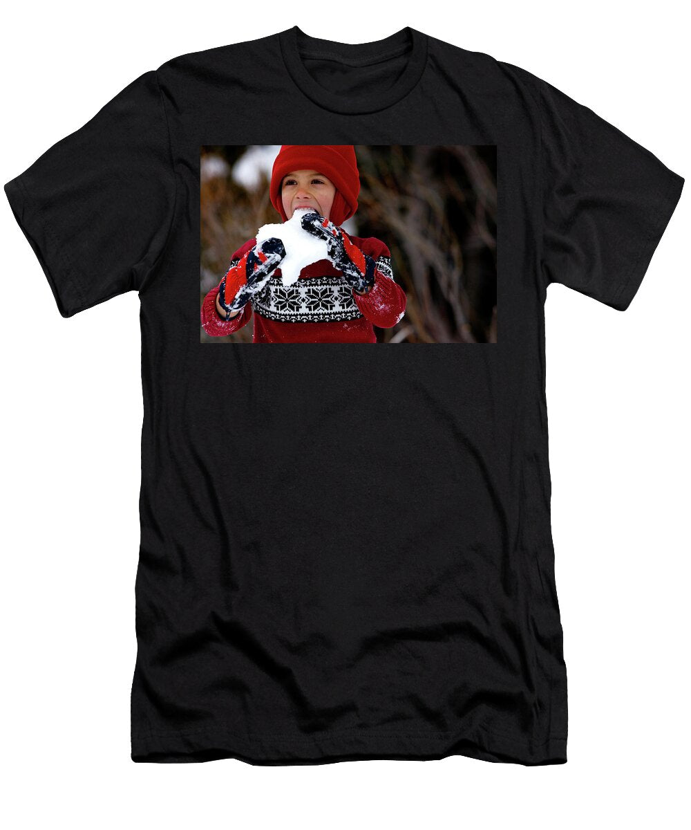 A Cute Young Boy Eating Snow Corey Rich T-Shirt