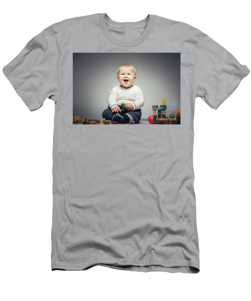Giggling Child Sitiing on the Floor with Toys Michal Bednarek T-Shirt