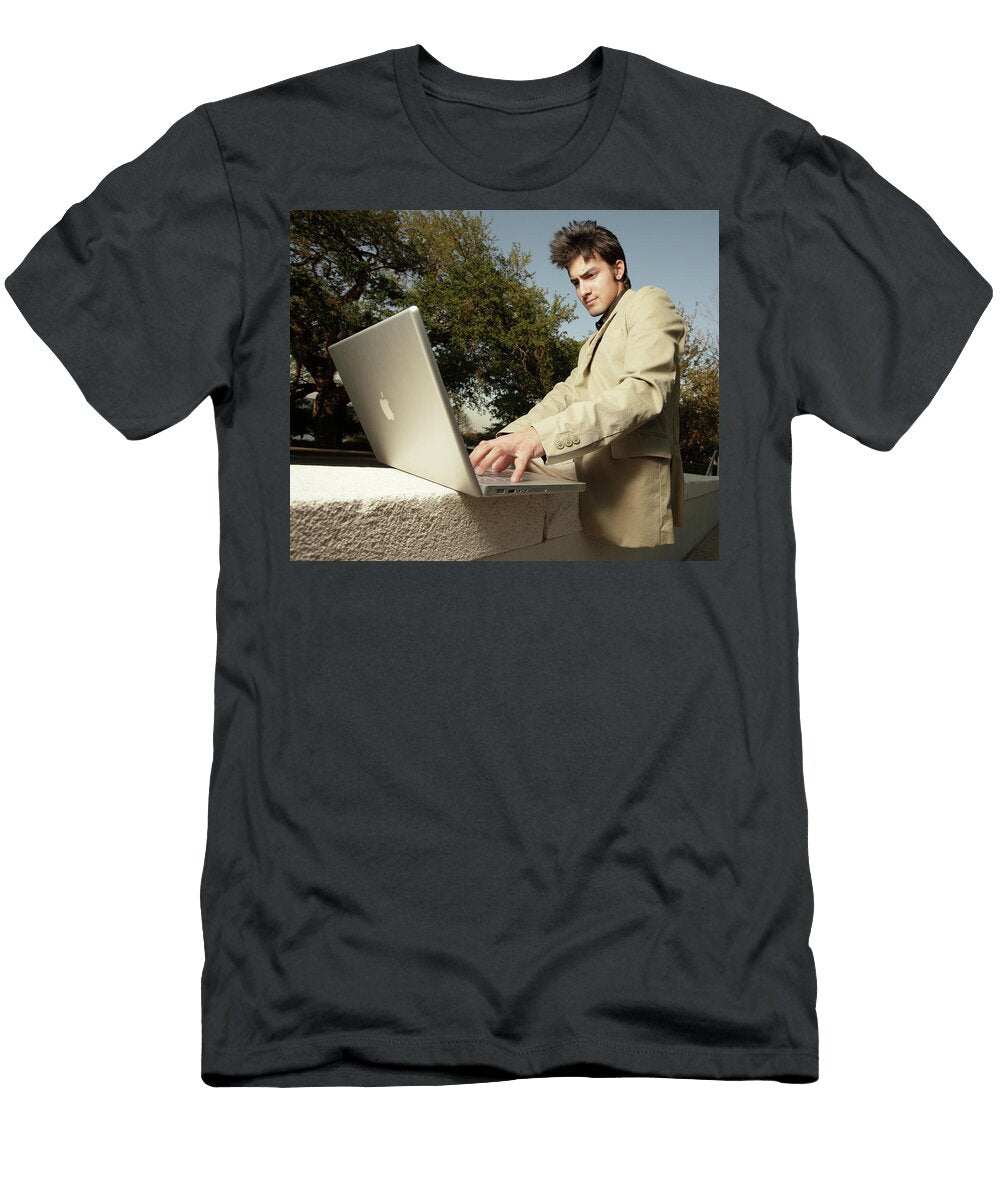 Goofy Looking Businessman on a Laptop Felix Mizioznikov T-Shirt