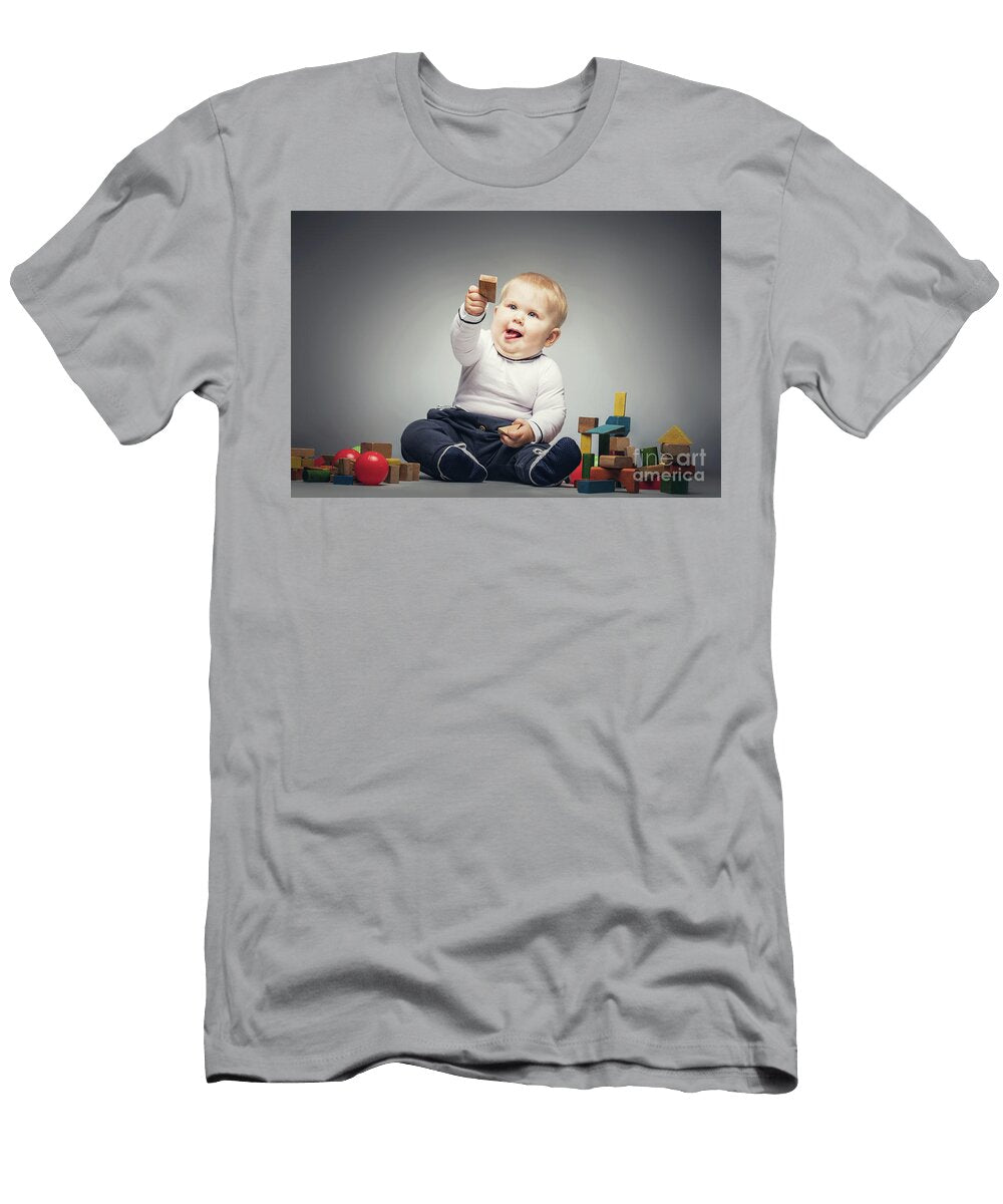 Little Boy Handing a Wooden Brick Michal Bednarek T-Shirt