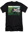Small Cute Dog Lying on the Grass Marko Jegdic T-Shirt