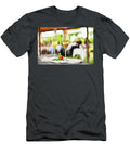 Two Glasses of Bubbly Champagne with Unfocused Background of a C Joaquin Corbalan T-Shirt